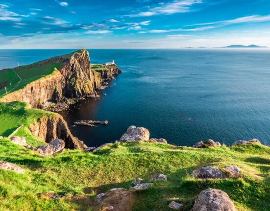 Stunning dusk at the Neist point lighthouse in Isle of Skye, Scotland